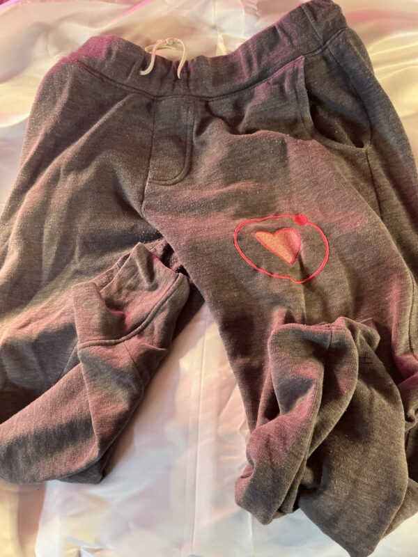 Grey track pants